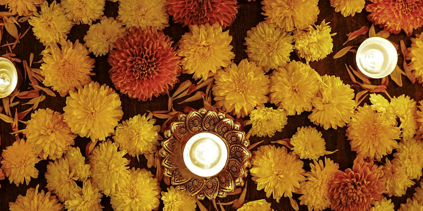 Marigolds and diyas laid out for a festival