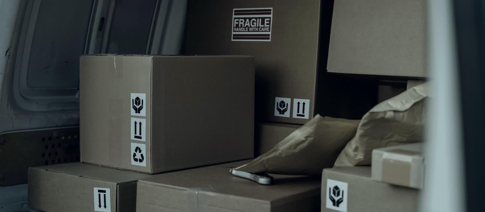 Parcels stacked inside a delivery van